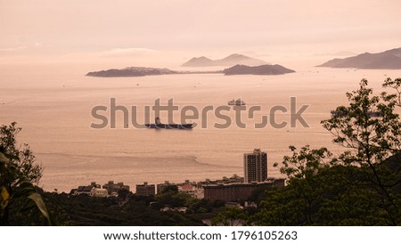 Hong Kong ocean sunset mountain heaven background nautical vessel cargo boat industry