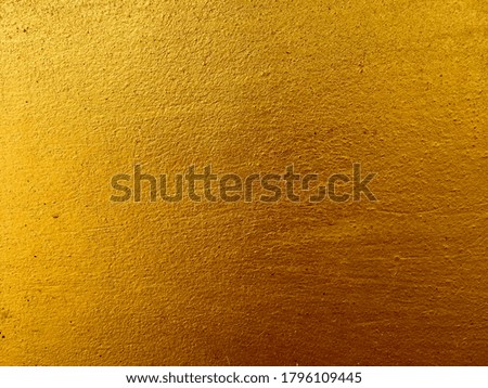 Gold color wall texture background abstract 