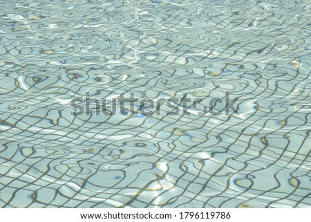 Waved water in basin as a background