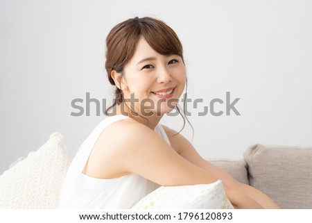 Asian young woman in the room