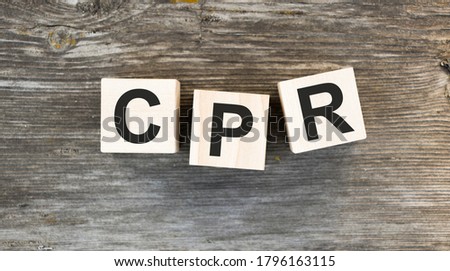 CPR - Cardiopulmonary Resuscitation acronym on wooden cubes