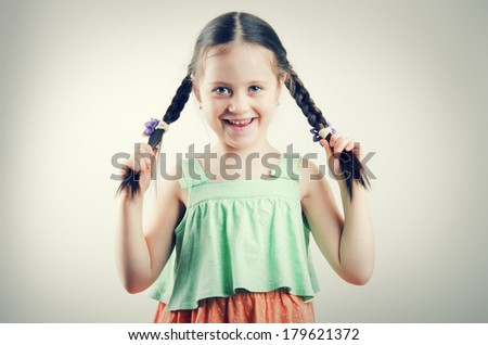 Pretty little girl with braids