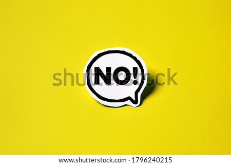 No speech bubble on white paper isolated on yellow paper background with drop shadow. COPY SPACE.