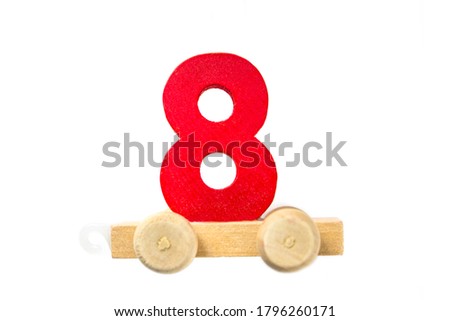 Wooden toy train with track numbers eight. Learn, make. Wooden number eight. Children s school concept. Educational games