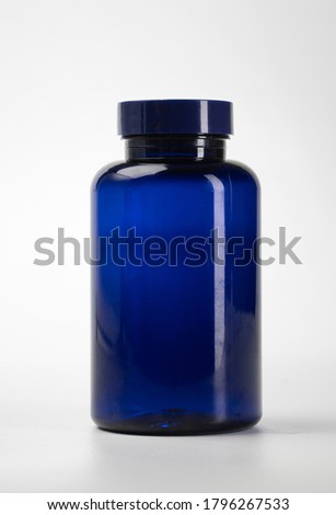 caplets medicine bottle isolated on white background.