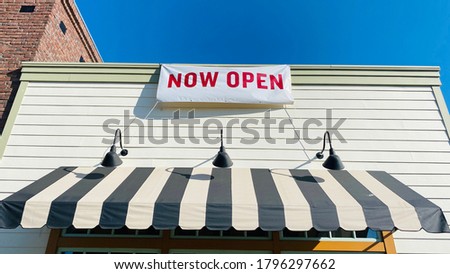 Now Open Banner Sign on Restaurant Store Shop Outside Royalty-Free Stock Photo #1796297662