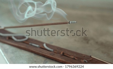 incense stick Smoking on a stand, Eastern culture. the subject of rituals.