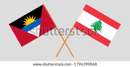 Crossed flags of Lebanon and Antigua and Barbuda