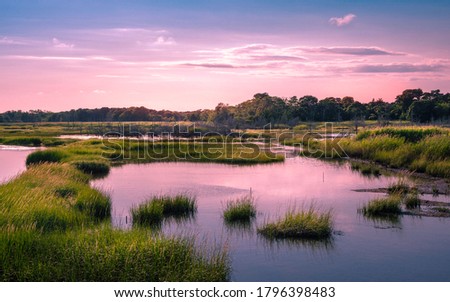 Twilight cloudscape over the flooded marsh at high tide on Cape Cod
