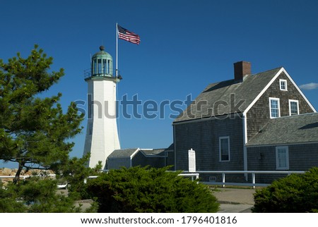 Scituate lighthouse in Massachusetts with adjoining keepers quarters, now a museum. The unique tower and building are the oldest complete original combination in the country.