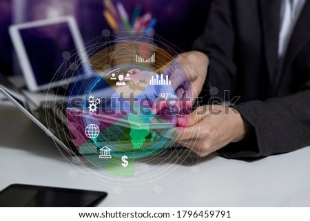 Double exposure of businesswoman hand  working on laptop with business financial infographic chart, Digital marketing concept.