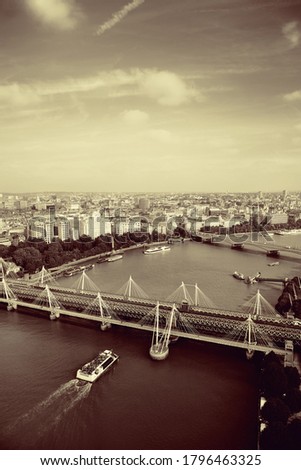 City aerial view from London Eye over Thames River.