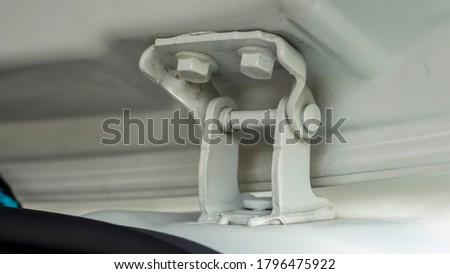 Close up of the trunk door hinges on modern cars Royalty-Free Stock Photo #1796475922