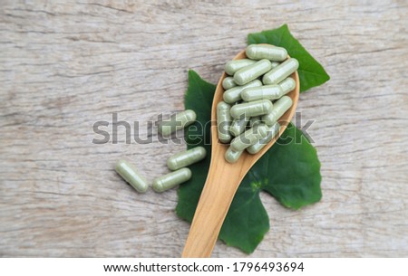 top view of herbal supplement in capsule from organic herb for health care eating in daily life 