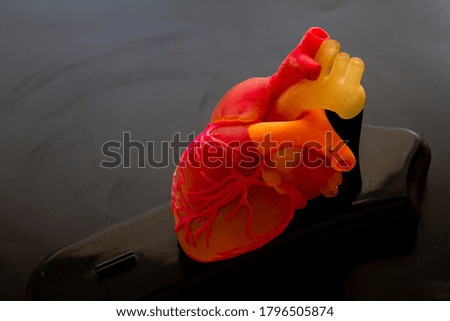 3D printed human heart close up. 3d printing Technology. Royalty-Free Stock Photo #1796505874