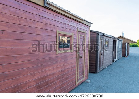 Small wooden houses, baths are on the street for sale