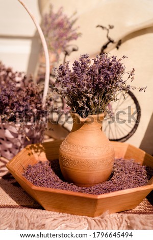 lavender in a beautiful vessel.  dried lavender, bouquet, painting, flat lei. 