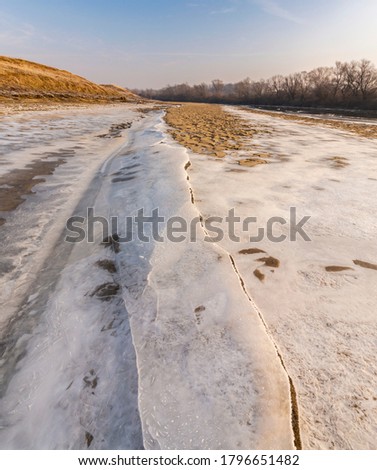 Beautiful winter scenery, with fresh snow, ice and frost, in the countryside