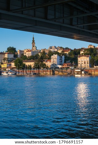 Beautiful summer view of the historic center of Belgrade from the bank of the Sava River near Branko's bridge (Brankov most), Serbia. People and signs unrecognizable.