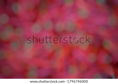 Blurred abstract red background with bokeh