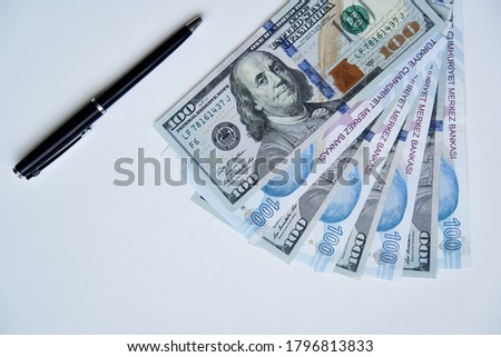                         Dollar and Turkish Lira top view. Detail shot on white background            