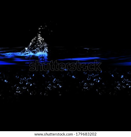 Water and air bubbles over black background