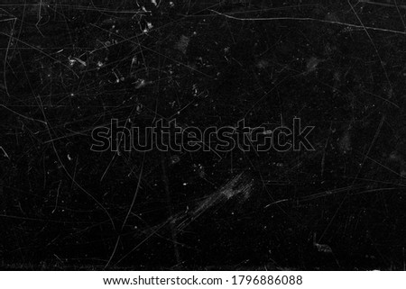 grunge scratches texture on black background Royalty-Free Stock Photo #1796886088