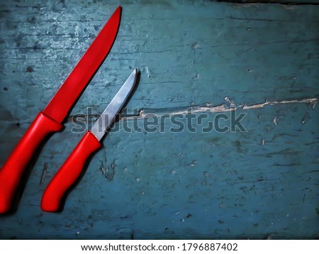 Placed a knife on the wooden surface to create ja wallpaper.