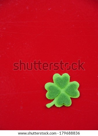 Green clover leaf with green hearts