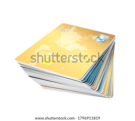 Stack of plastic credit cards on white background