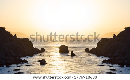 sea bay with rocky coast at the sunset, outdoor natural background