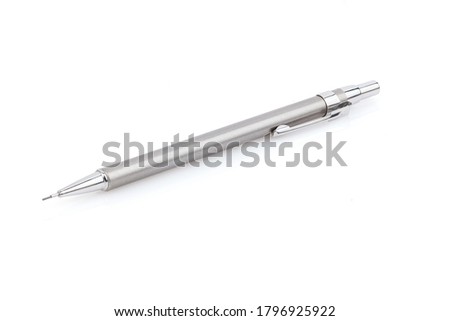 Silver metal mechanical pencil on white background. Mechanical pencil isolated on white. Close up. Full depth of field.