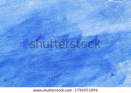 Blue watercolor on art paper background for design in your work texture concept.