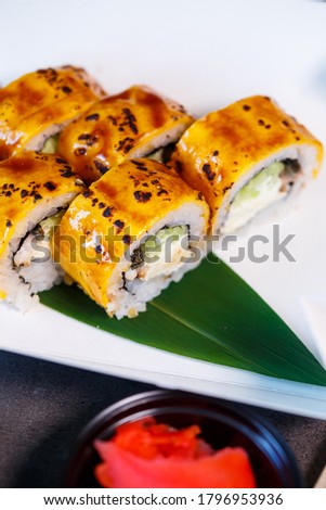 A set of sushi from many types of roles and with different stuffing. Sushi menu. Japanese gourmet sushi.