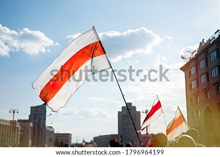Flag of Belarus. White red white. Peaceful protest in Minsk. August 16, 2020                             