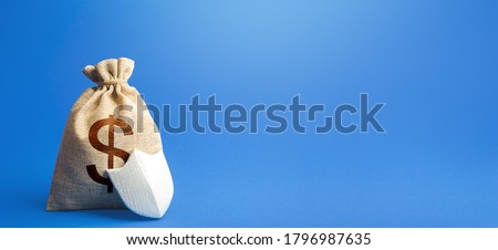 Dollar money bag and protection shield. Ease doing business. Guaranteed deposits insurance compensation. Investment protection. Strength of the financial system. Sustainable banks. Royalty-Free Stock Photo #1796987635