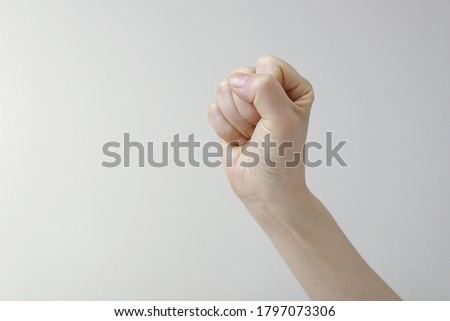 Close up of woman hand holding fist

