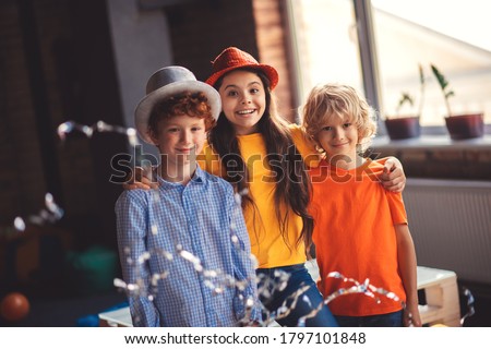 Bday. Three cute kids having a birthday party