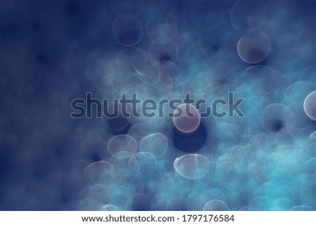 Beautiful abstract bokeh on a blue background pattern for design. 