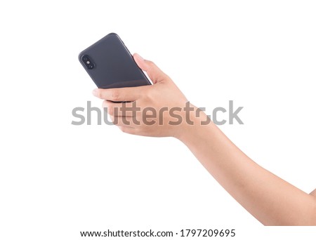 Female hand holding and touching on mobile smartphone show back side. Royalty-Free Stock Photo #1797209695