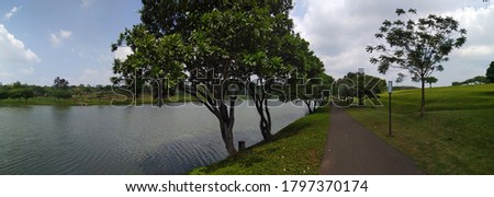 Jogging track between park and lake