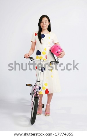 Young Woman with Bicycle