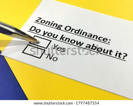 One person is answering question about zoning ordinance. Royalty-Free Stock Photo #1797487354