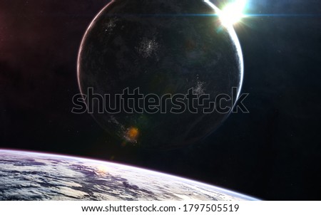 Rising star glow from deep space planet. Science fiction. Elements of this image furnished by NASA