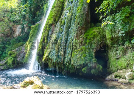 View of Vadu Crisului waterfall in Apuseni mountains, from Bihor county, Romania. Royalty-Free Stock Photo #1797526393