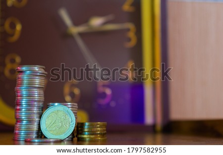 Metal coins stack and obverse 2 Euros.