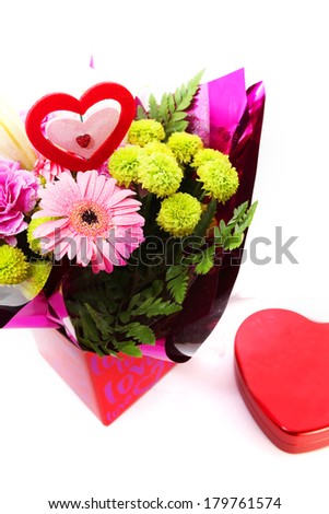 Mixed flowers for valentine with heart shape sign isolated on white