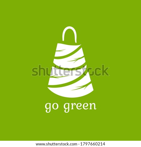 Green shopping bag made of leaves. Reuse or recycle eco package for products or food. flat icon isolated on green. vector illustration. No plastic Go green concept