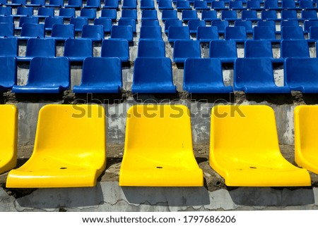 Abstract background with sits on stadium: blue and yellow colors, perspective view. 