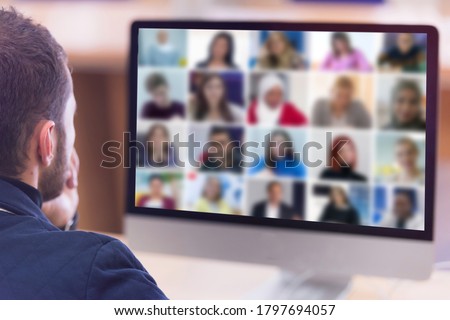 Online remote learning. Teacher with computer having video conference chat with student and class group. Teaching and learning from home during quarantine and coronavirus outbreak. Royalty-Free Stock Photo #1797694057